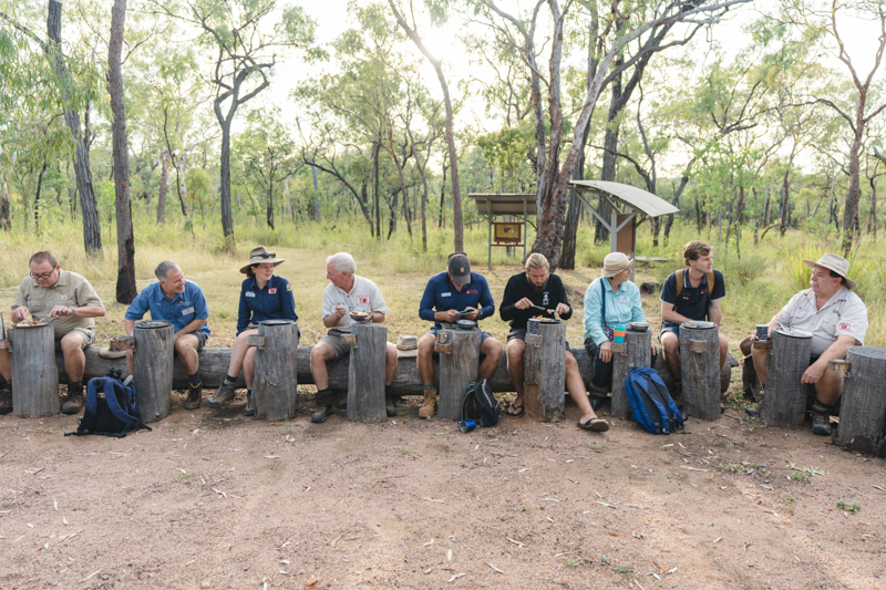 A group of Savannah Guides enjoy a bush breakfast at Undara Experience.